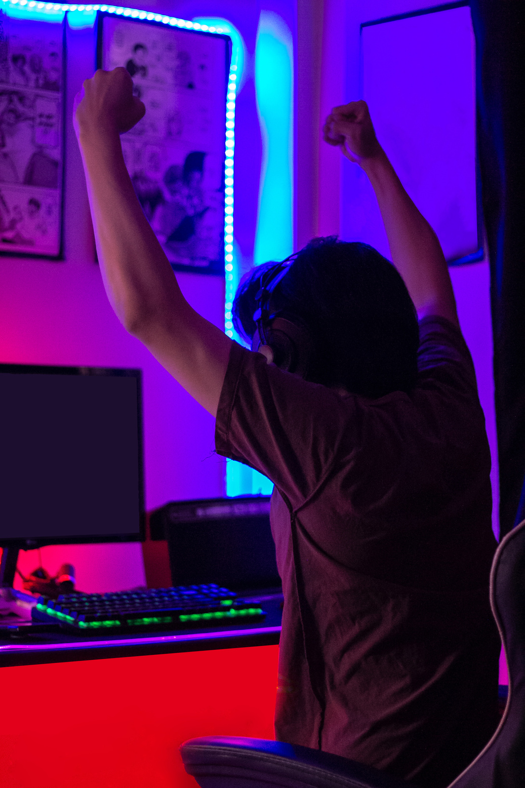 Happy Male Gamer Celebrating Success in the Game